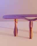 Luxury glass console table featuring organic sculptural supports. Designed to combine functionality with collectible design.
