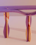 Sculptural glass console table with an expressive artistic silhouette. A luxury furniture piece for modern interiors.