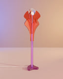 Sculptural floor lamp inspired by the form of a lotus flower. A designer lighting piece combining art glass and contemporary design.