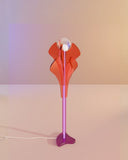 Contemporary designer lamp with handcrafted floral-inspired forms. Crafted as a statement lighting piece for sophisticated interiors.
