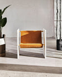Contemporary marble chair with an architectural profile. Designed for luxury collectible interiors.