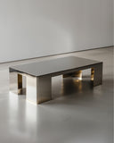 Contemporary stone coffee table with a geometric architectural silhouette. Designed as a statement centrepiece for modern living spaces.