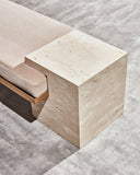 Luxury travertine bench featuring a monolithic architectural silhouette. Designed as a statement seating piece for refined interiors.