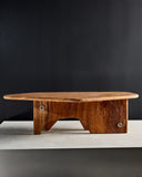 Sculptural coffee table with an organic rounded silhouette. A designer centre table celebrating natural craftsmanship.