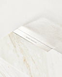 Contemporary marble mirror with a sculptural architectural profile. Crafted to highlight natural stone veining and texture.