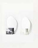 Luxury marble floor mirror with contemporary architectural detailing. Crafted as a functional work of collectible design.