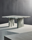 Sculptural glass coffee table with a natural stone base. A designer centre table inspired by contemporary collectible design.