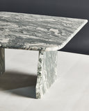 Designer coffee table combining textured stone and glass. Crafted to highlight material contrast and craftsmanship.