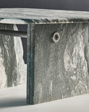 Contemporary designer coffee table showcasing natural stone textures. Crafted to create visual depth and elegance.