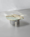 Contemporary round coffee table with a sculptural metal base. Designed as a statement piece for modern interiors.