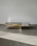 Sculptural stone coffee table with architectural detailing. Designed as a collectible design piece for modern interiors.