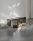 Sculptural credenza featuring reflective metal panels and clean geometric lines. A designer storage cabinet for contemporary luxury interiors.