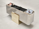 Sculptural storage console with a minimalist metal profile. Designed to elevate contemporary living spaces.