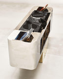 Designer console showcasing reflective metal surfaces and clean lines. A luxury furniture piece for sophisticated interiors.