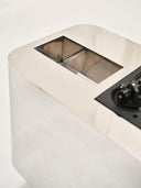 Luxury DJ table with metal finish. Contemporary collectible console.