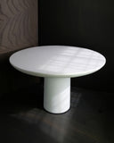Sculptural side table featuring smooth contemporary lines and refined craftsmanship. A designer accent table for luxury modern interiors.