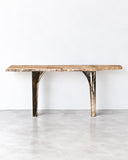Alex Turco Andrew Console Table featuring an elongated, organically edged stone-look top supported by sculptural, contrasting legs. Its natural patterning and asymmetrical details create a distinctive architectural accent for contemporary interiors.