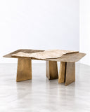 Alex Turco Stoneage Coffee Table featuring layered, irregular stone-look surfaces and chunky angular supports in warm natural tones. Its raw, sculptural composition celebrates organic forms and distinctive material patterning.