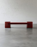 CoEx RedUx Rouge designer bench featuring a deep red sculptural seat and rounded geometric supports. A statement bench for contemporary luxury interiors.
