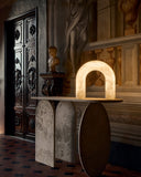 Handcrafted table lamp inspired by architectural geometry. Designed as a sculptural focal point for interiors.
