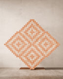 Luxury cabinet featuring a faceted geometric exterior. Designed as a statement storage piece for contemporary interiors.