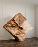 Sculptural cabinet with angular architectural forms. Designed to create visual impact in modern interiors.