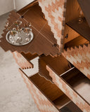 Luxury storage cabinet with intricate geometric detailing. Crafted as a functional work of art.