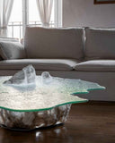 Sculptural coffee table featuring textured glass elements. A designer centrepiece for luxury residential spaces.