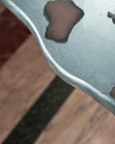 Organic glass dining table with a handcrafted appearance. A luxury furniture piece for statement interiors.