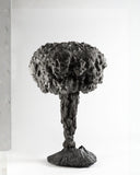 Sculptural designer table lamp with an organic textured form. Inspired by natural stone formations and contemporary cra