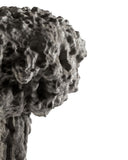 Sculptural lamp with a textured stone-inspired surface. Designed to bring artistic character to luxury spaces.
