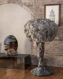 Organic designer lamp with a textured surface finish. Crafted as a statement piece for luxury environments.