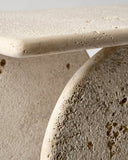 Contemporary console table with sculptural travertine supports. Inspired by architectural arches and geometric balance.