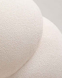 Contemporary designer armchair with an inviting sculptural silhouette. Crafted to combine comfort with modern design.
