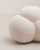 Luxury pouf showcasing soft contemporary forms and elegant detailing. Crafted as a versatile seating piece for modern interiors.