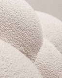 Designer accent pouf featuring sculptural comfort and timeless contemporary design. Created to enhance luxury residential spaces.