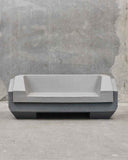 Sculptural sofa featuring soft upholstered forms and organic contemporary curves. A designer sofa crafted for luxury living spaces.