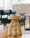 Designer side table showcasing handcrafted natural fibre and refined organic forms. Crafted to add warmth and texture to sophisticated interiors.