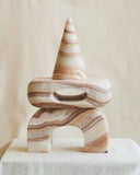 Designer object handcrafted from premium pink marble with an elegant architectural form. Crafted to bring colour and timeless character to contemporary interiors.