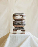 Contemporary brown marble object featuring sculptural geometry and artisan stone craftsmanship. Designed as a statement object for modern living spaces.
