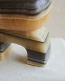 Luxury marble object showcasing vibrant yellow stone and contemporary sculptural design. Created to add colour and elegance to modern interiors.