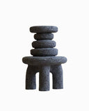 Sculptural object crafted from natural volcanic rock with a contemporary architectural silhouette. A designer stone object created for luxury modern interiors.