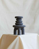 Contemporary volcanic rock object featuring organic stone textures and refined craftsmanship. Designed as a statement accent object for sophisticated interiors.