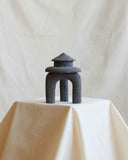 Contemporary object handcrafted from volcanic rock with sculptural proportions and organic texture. Designed as a statement object for modern living spaces.