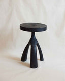 Luxury timber side table featuring natural wood textures and a minimalist silhouette. Designed for sophisticated residential and hospitality interiors.