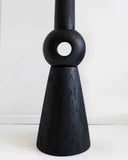 Designer wooden object showcasing solid timber construction and refined organic forms. Crafted to bring warmth and timeless character to contemporary spaces.