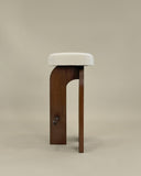 Designer bench with sculptural timber construction and geometric detailing. A statement furniture piece for sophisticated spaces.