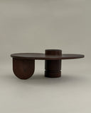 Contemporary wooden table showcasing handcrafted detailing throughout. Crafted to balance functionality and artistic design.