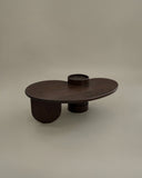 Sculptural timber table featuring handcrafted joinery and detailing. Designed for contemporary residential interiors.