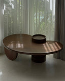 Luxury wooden dining table with a bold sculptural base. A designer piece inspired by collectible design.